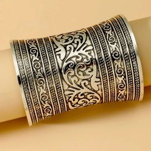 BOGO -50%!!Adjustable metal wrist cuff. Dope statement to almost any ensemble!!